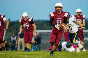 Despite low numbers, Trinity blasts Hundred 63-0